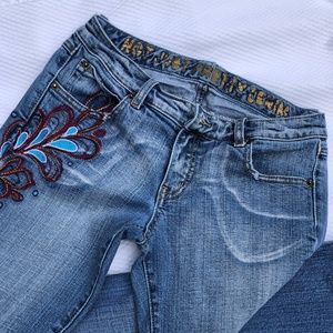 5 pocket Plugg Flare-leg flower embroidered jeans